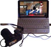 Photo of camera and laptop showing a video analysis of sprinter diva